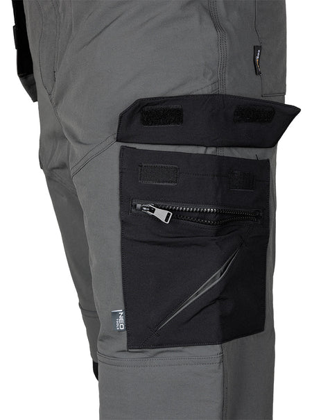 Pracovné nohavice Mix&Match, 4-cestný elastický materiál, s puzdrami, Cordura, šedá/čierna, veľkosť S od NEO TOOLS nájdeš na naravis.sk