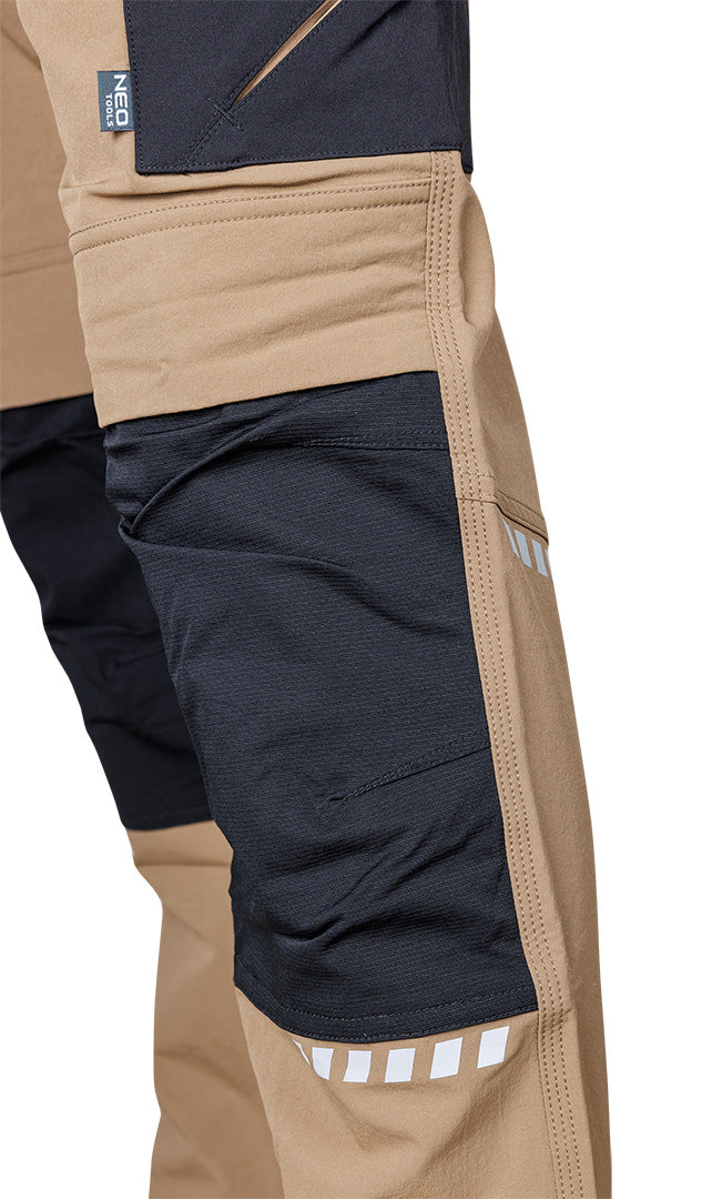 Pracovné nohavice Mix&Match, 4-cestný streč, s puzdrami, Cordura, béžová/čierna, veľkosť XXXL od NEO TOOLS nájdeš na naravis.sk