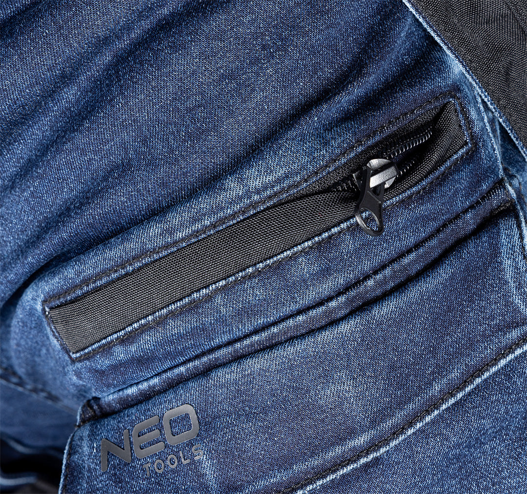 Pracovné nohavice DENIM, výstuž Cordura, odnímateľné vrecká, námornícka modrá, veľkosť M od NEO TOOLS nájdeš na naravis.sk